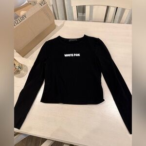 White Fox Love Addiction Long Sleeve Baby Tee in Black